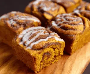 Delicious Cinnamon Swirl Pumpkin Bread Mini Loaves topped with a cinnamon sugar crust, perfect for fall baking