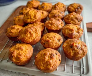 Delicious mini sweet potato muffins fresh out of the oven, perfect for a healthy snack or breakfast treat.