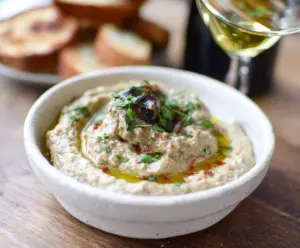 Creamy Baba Ganoush made from roasted eggplants served as a delicious Middle Eastern dip.